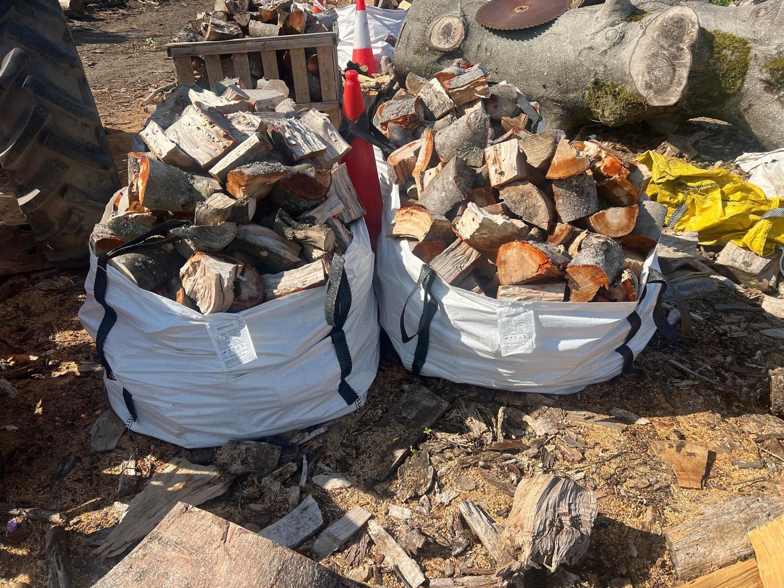 Two bulk bags of split logs ready to go